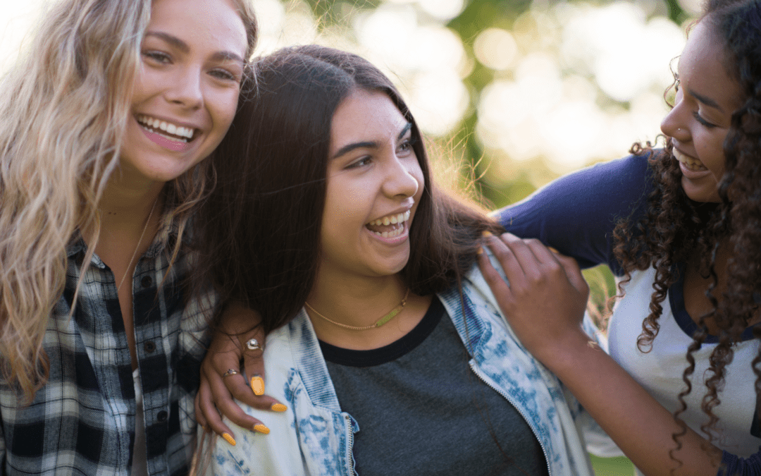 young teen girls talking and laughing