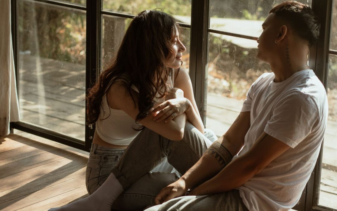 couple sitting at a window together